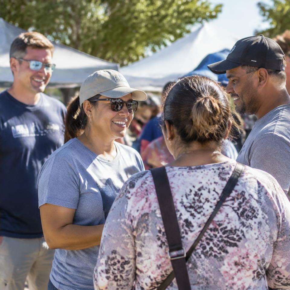 Volunteers meeting neighbors at a community outreach event